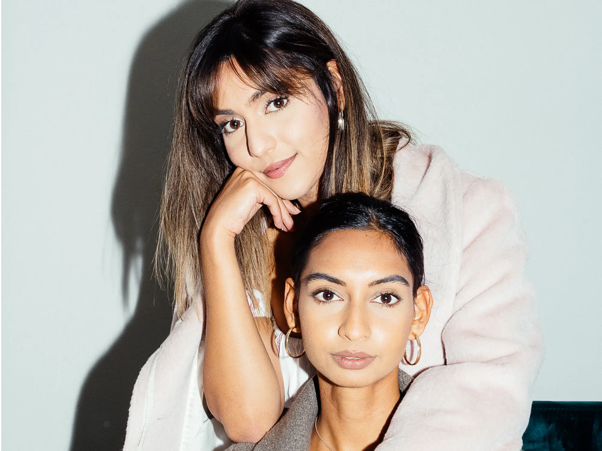 Blume co-founders Taran and Bunny Ghatrora pose together in a candid portrait